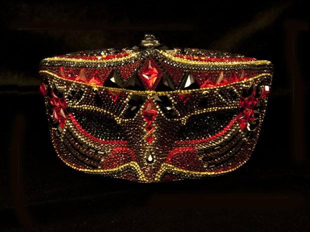 Judith Leiber’s Mardi Gras-ready crystal mask handbag 