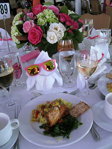 The stunning table settings for the Breast Cancer Alliance Benefit Luncheon & Fashion Show featured rose and hydrangea arrangements by Greenwich Orchids and pink reflective sunglasses. Photograph by Robin Costello.