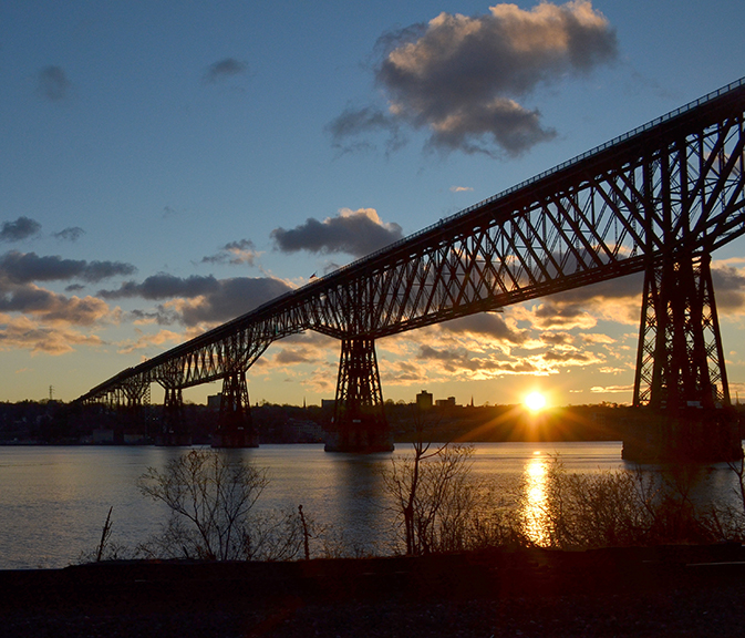 Walkway Over the Hudson, at sunrise from the Highland side. Photograph by Fred Schaeffer, courtesy the Northern Dutchess Symphony Orchestra.