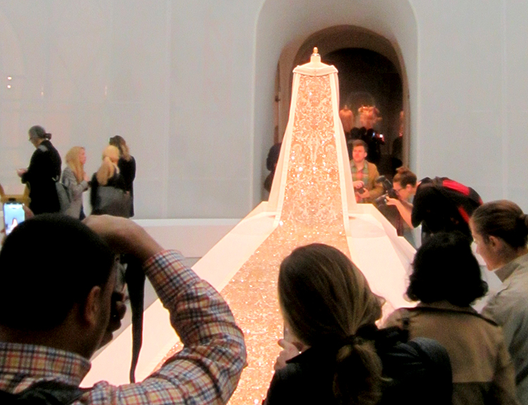 The “Manus x Machina” exhibition showstopper is an autumn/winter 2014-15 wedding ensemble by Karl Lagerfeld for House of Chanel. Photograph by Mary Shustack.