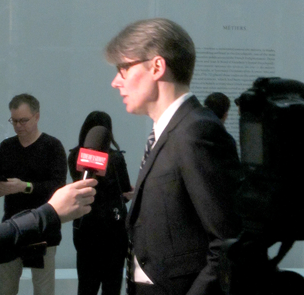 Andrew Bolton, curator in charge of The Costume Institute and organizer of “Manus x Machina” at The Metropolitan Museum of Art, was a sought-after interview subject during Monday’s press preview. Photograph by Mary Shustack.
