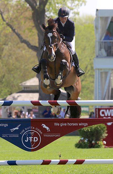 Beezie Madden and Vanilla fly during the Old Salem Farm Spring Horse Shows. 