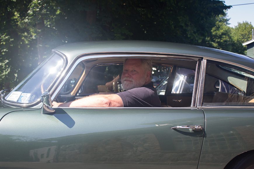 Bob Millstein at the wheel of his Aston Martin DB4 Series II. Photograph by Sebastian Flores.