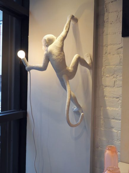 Quirky lighting is a playful touch at Burkelman in Manhattan.