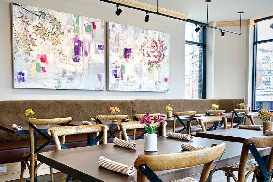 The dining room seats about 40 and features custom artwork by local artist, Jenn Lewis, of Harrison. 