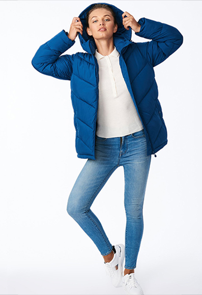 The beautiful Bernardo jacket rolls up into a pillow that's perfect for the plane ride.