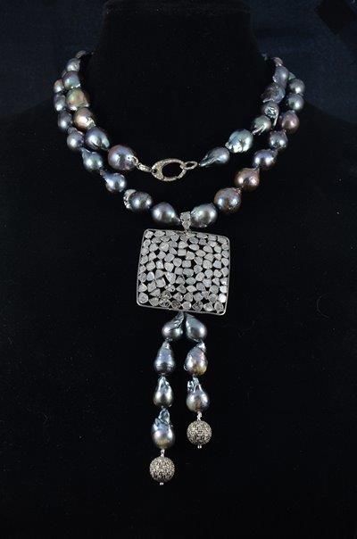 Cream, silver and tan baroque Akoya pearl necklace with XL champagne diamond lobster clasp and lace diamond beads, $2,375.