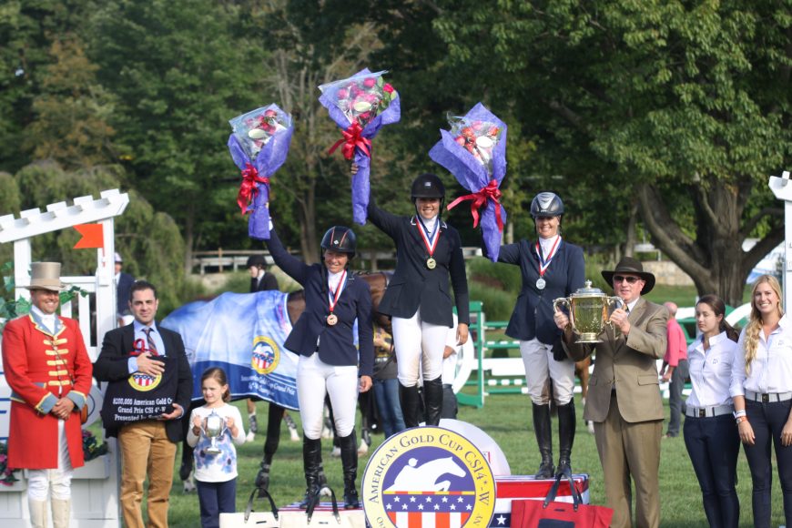 The presentation ceremony at the 2013 American Gold Cup. From left: Winners Beezie Madden, Brianne Goutal, Tracy Fenney and Suncast’s Richard Bourns. Photograph by Carrie Wirth/Phelps Media Group. Courtesy the American Gold Cup.