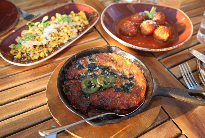 A savory trio of Mexican street corn, albondigas (meatballs) and queso fundido (fried cheese).