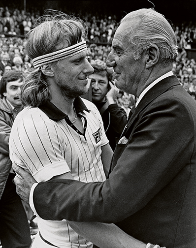 July 1978, London, England, UK --- Fred Perry congratulates Bjorn Borg at Wimbledon after the Borg equalled his record by winning the Men's Singles title three times in succession. --- Image by © Hulton-Deutsch Collection/CORBIS