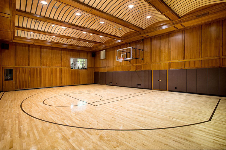 Former New York Knick Allan Houston’s 19,300-square-foot Armonk home features an indoor basketball court and premier fitness room. The $19.9 million dollar home is currently on the market. Courtesy Sotheby's International Reality.