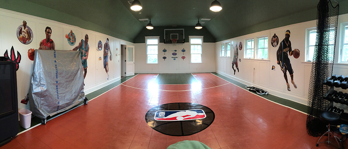 The second-floor basketball court at blends seamlessly into a house in Old Greenwich. Courtesy Houlihan Lawrence.