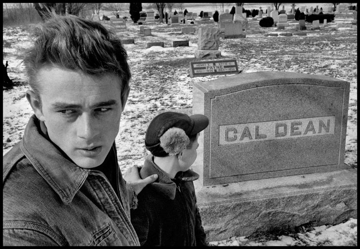 James Dean at gravestone of his great-grandfather, Cal Dean, in Fairmount’s Park Cemetery.©2015 Dennis Stock/Magnum Photos.