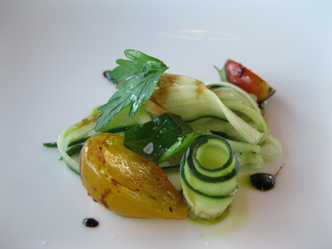 Cucumber and heirloom tomatoes in balsamic vinaigrette.