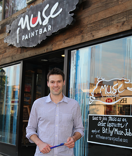 Stan Finch, a co-founder of Muse Paintbar, in front of the White Plains studio.