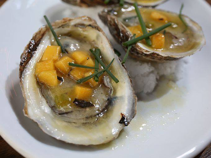 Oysters on the halfshell with mango mignonette
