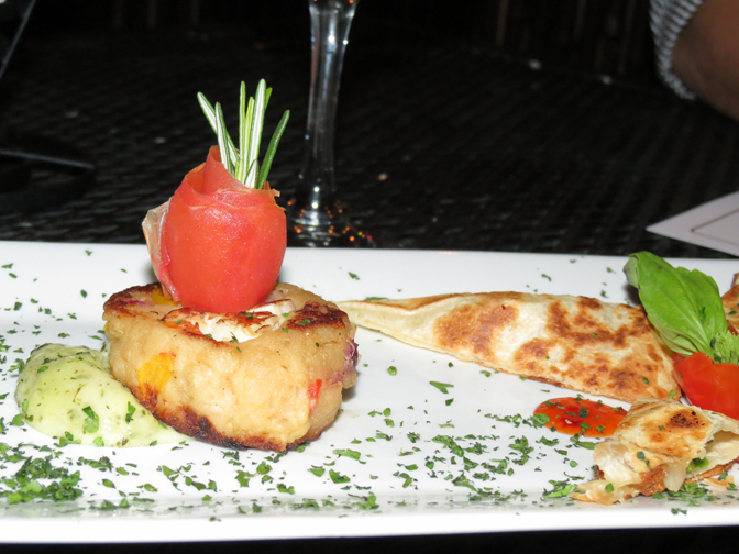 A crab cake with a quesadilla.