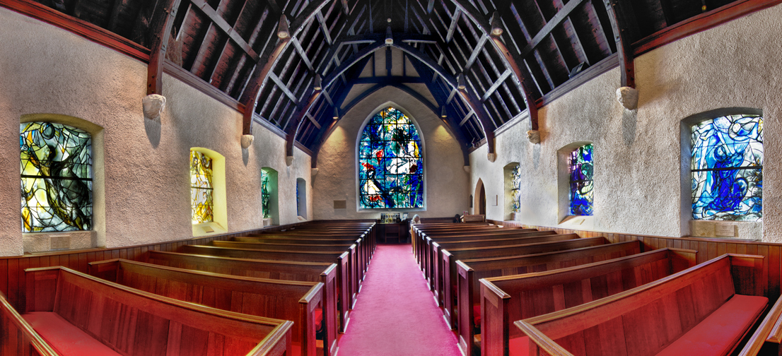 A panorama of the Union Church of Pocantico Hills’ interior, with “The Good Samaritan” at the far end. Photograph by Jaime Martorano. Courtesy Historic Hudson Valley.