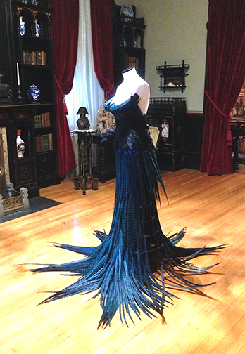 Artist Catherine Latson’s “Dancing With Death,” a feathered gown, is on display at the Hudson River Museum in Yonkers. Photograph by Catherine Latson.