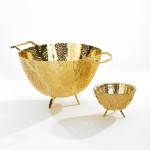 Espera bowls, 24k gold-plated creations designed by Anna Rabinowicz, include the large colander/fruit bowl ($1,350) and the small fruit/nut bowl ($330). Photograph courtesy of The Glass House Design Store. 
