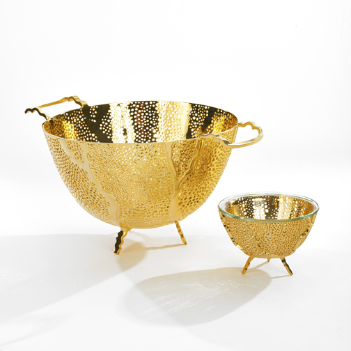 Espera bowls, 24k gold-plated creations designed by Anna Rabinowicz, include the large colander/fruit bowl ($1,350) and the small fruit/nut bowl ($330). Photograph courtesy of The Glass House Design Store.
