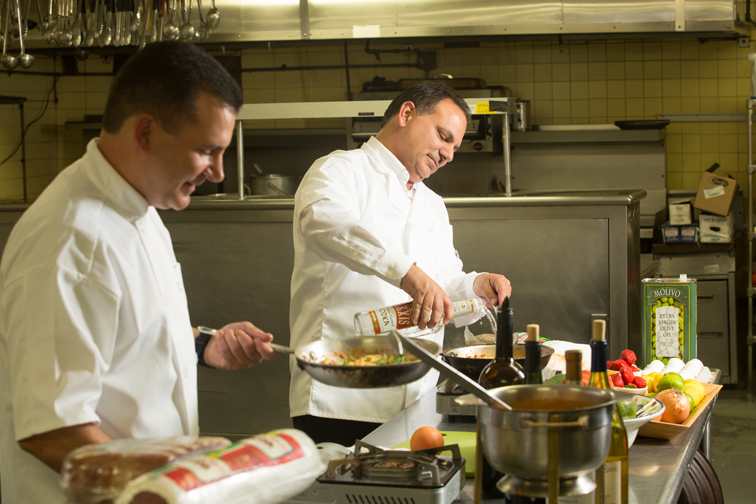 From left, Joseph Ciuffetelli and Al Ciuffetelli work side by side in the kitchen. Photograph by John Rizzo.