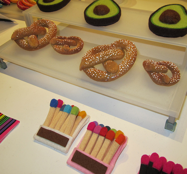 Hot pretzel brooches have joined the lineup of felt creations by Danielle Gori-Montanelli. Photograph by Mary Shustack.