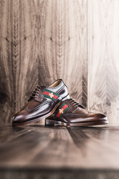 A pair of Gucci wing-tip shoes, available at Neiman Marcus, makes a bold fashion statement for the men on your shopping list. Photograph courtesy of Neiman Marcus.