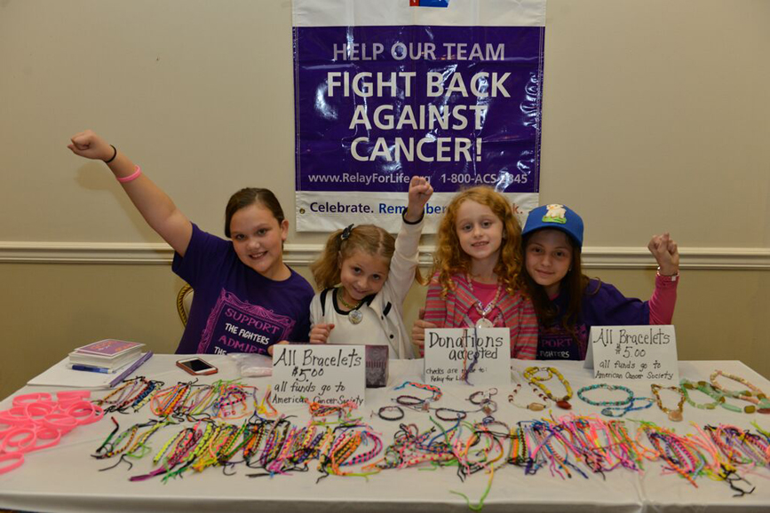Make a Difference With Loukoumi supporters sell bracelets to raise money for the American Cancer Society.