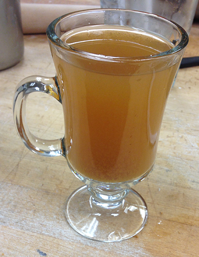 Sipping on City Limits’ spiked apple cider makes baking even better. Photograph by Danielle Brody