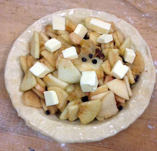 Chef Tracy Kamperdyk Assue suggests packing squares of cold quality butter into the pie and glazing the dough with an egg wash. Photograph by Danielle Brody