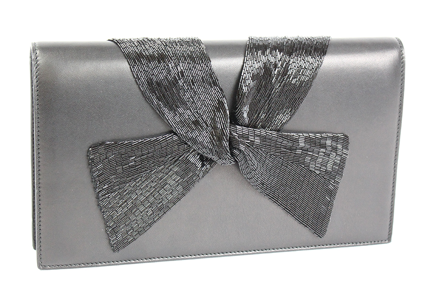 Women’s Holiday Dressing options from Ralph Lauren include the Ralph Lauren Collection Beaded Bow Foldover Clutch ($2,750). Photograph courtesy of Ralph Lauren.