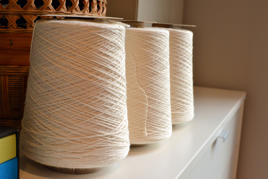 Spools of yarn in Kavulla's workshop. Photograph by Bob Rozycki. 