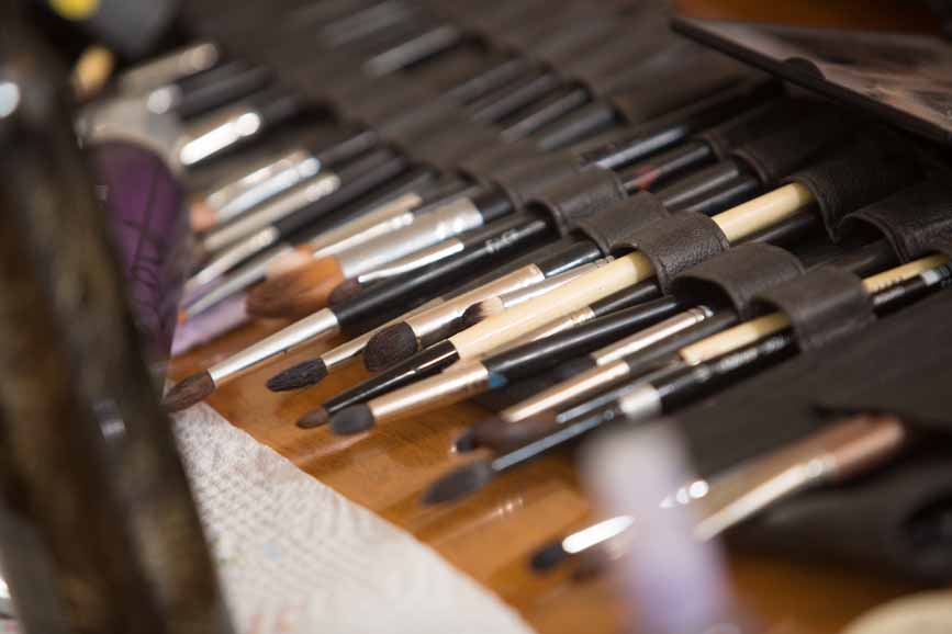 A close-up view of Brown's assortment of makeup brushes.