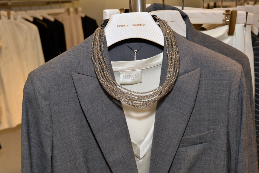 Background photo features charcoal, wool blazer with lace cuff , $2,995; vanilla, silk “v” neck blouse, $795; and necklace, multistrand, clear, silver-grey choker, $1,425. All pieces are part of Brunello Cucinelli’s spring 2016 collection. Photograph by Bob Rozycki.