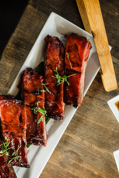 Chinese heritage spare ribs 
with honey and plum glaze. 
Photograph by 
Thomas McGovern.