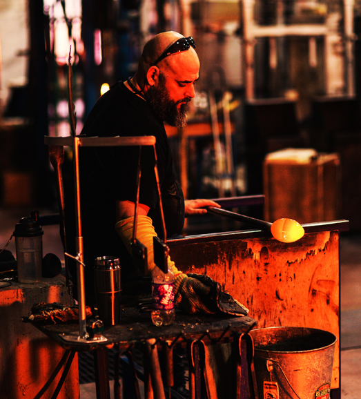 A glassblower at work at the Simon Pearce Mill in Quechee, Vt. Photograph courtesy of Simon Pierce.