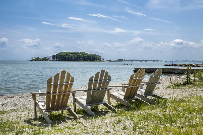 [1] Beach chairs near the water at the Shorehaven Road property.