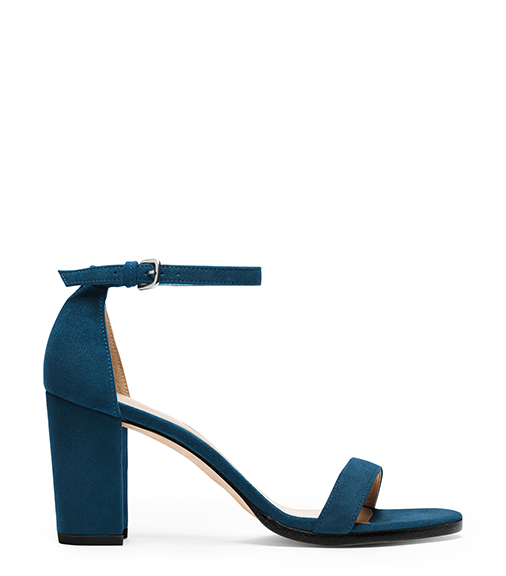 The Nearlynude Sandal ($398) from Stuart Weitzman offers an unexpected pop in aqua suede. Photograph courtesy Stuart Weitzman.
