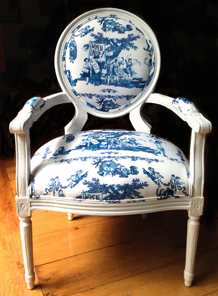 “White Louis XVI End Chair, Women’s Rights are Human Rights” by Laurel Garcia Colvin. Photograph courtesy of the artist. 