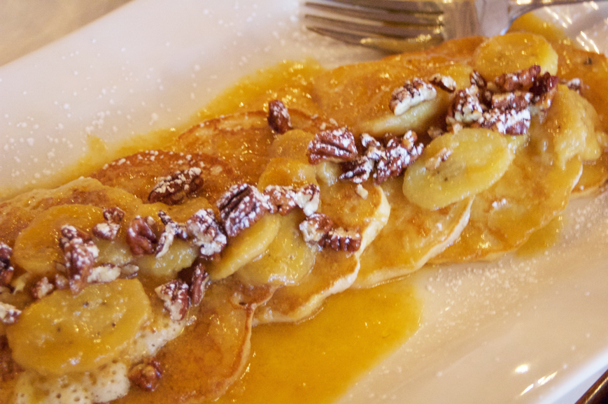 Bananas Foster griddle cakes topped with praline pecans. Photograph by Danielle Brody.