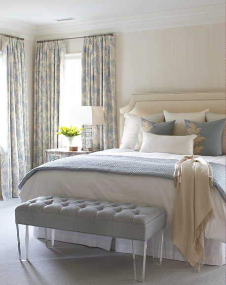 A muted palette creates a serene retreat in this bedroom designed by Muse Interiors. Photograph courtesy of Muse interiors.