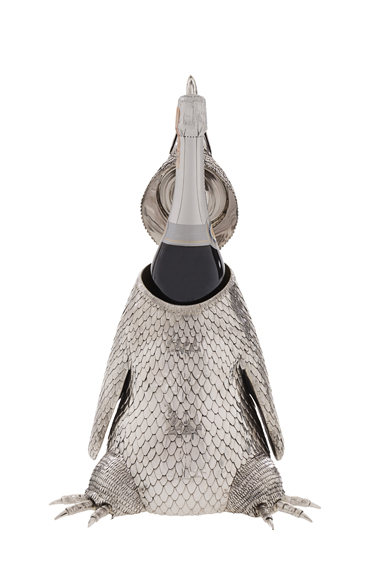 (2) The Sterling Silver Penguin Champagne Bottle Holder by Artemest. $11,360. Photograph courtesy Artemest