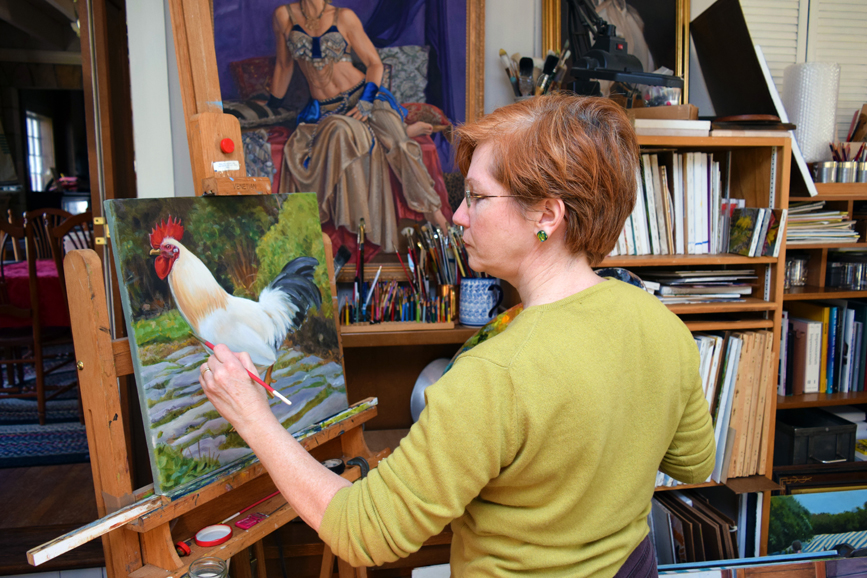 Gini Fischer, at work in her Wilton studio. Photograph by Bob Rozycki.