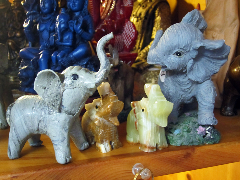 Elephant figurines, their trunks in the air symbolizing good luck. Photograph by Mary Shustack.