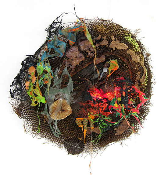Judy Pfaff, “Time is Another River” (2012), honeycomb cardboard, expanded foam, plastics and fluorescent light, part of  “The Nest’ at the Katonah Museum of Art through June 19. Courtesy of the artist. © Judy Pfaff 