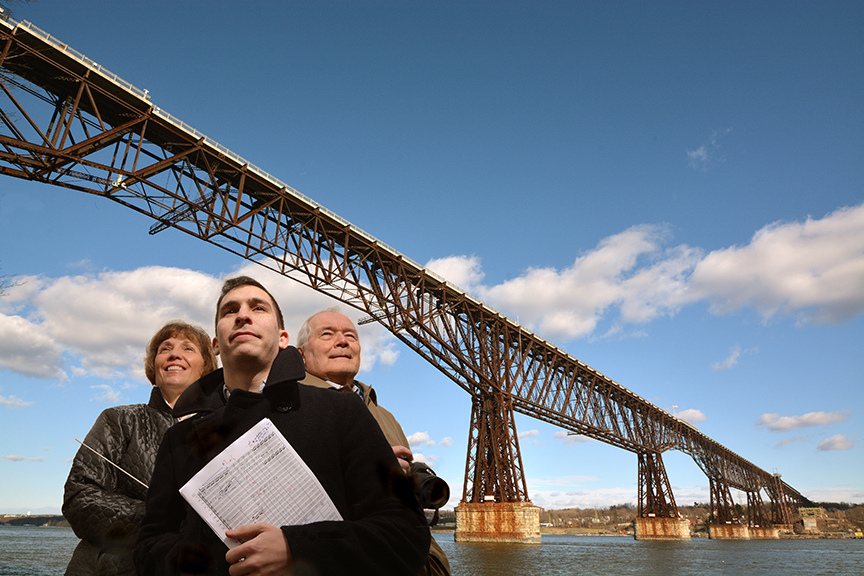 Kathleen Beckmann, Ben Kutner and Fred Schaeffer, from left, pictured at the Walkway Over the Hudson. Photograph by Guy Peifer, courtesy the Northern Dutchess Symphony Orchestra.