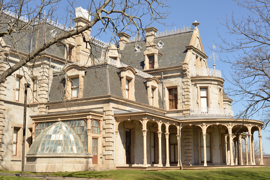 This exterior picture of the Lockwood-Mathews Mansion Museum shows the conservatory in the bottom left. Photograph by Bob Rozycki.