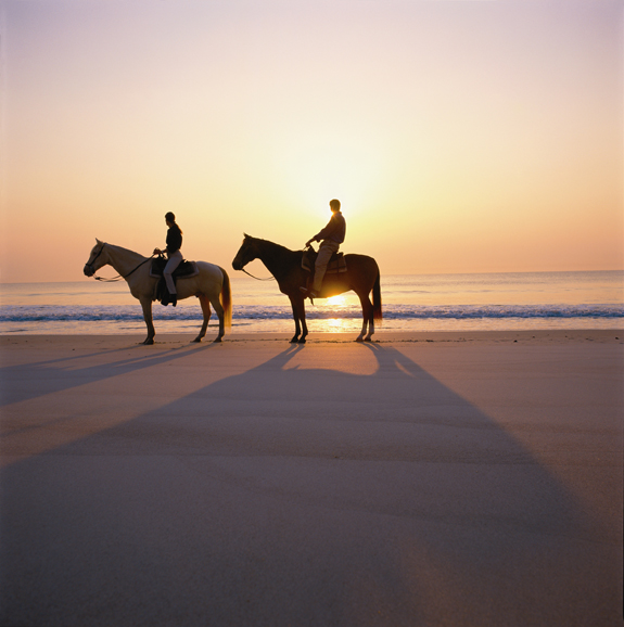 Horseback riding on the beach is permitted on Amelia Island. Photograph courtesy ameliaisland.com.