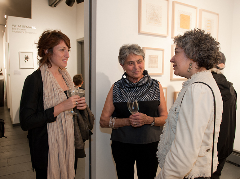 Artist Kaya Deckelbaum, center, chats with some of those attending the May 6 artists’ reception at Gallery 66 NY in Cold Spring. Photograph by Ellen Crane Photography.
